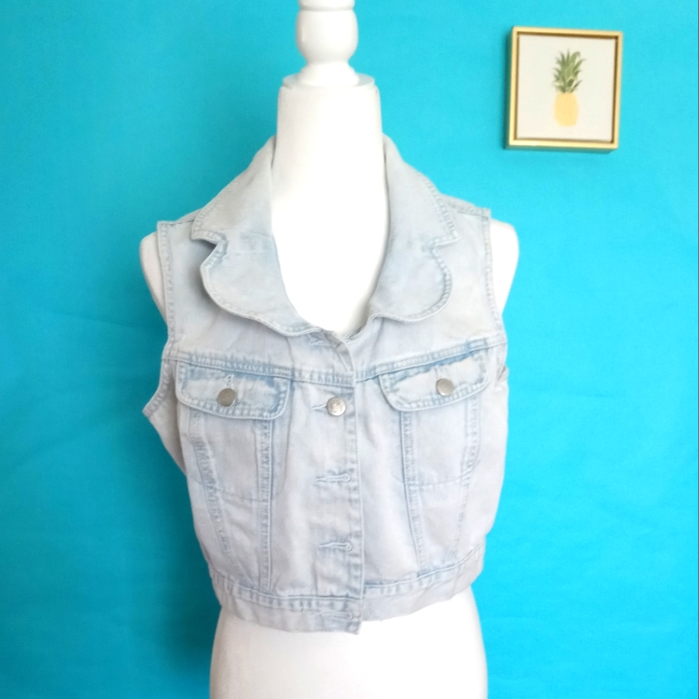 Vest L A . Blue  with a lace heart in the back  size  Large girls color light